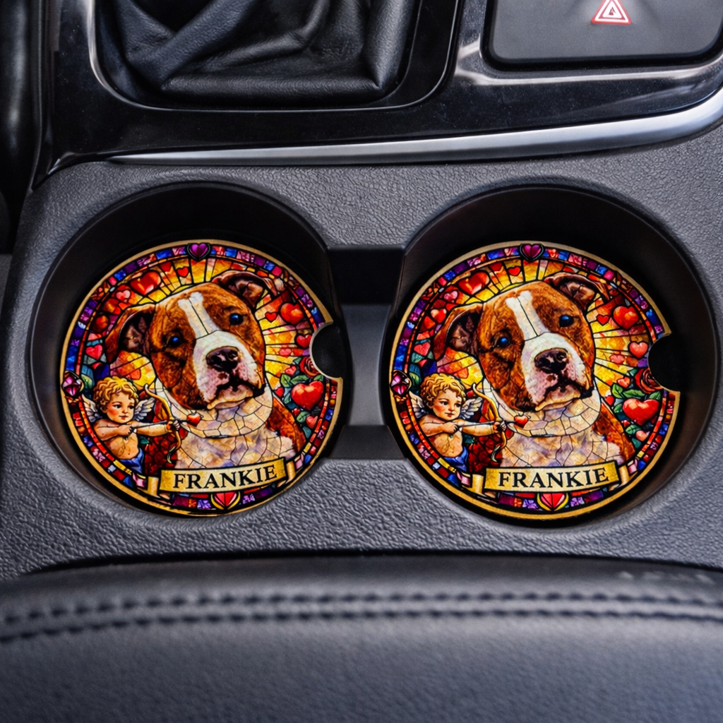 Two circular coasters with a dog illustration and 'FRANKIE' text on a car's cup holder.