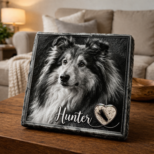 Decorative plaque with a dog's portrait and name 'Hunter' on a wooden surface.