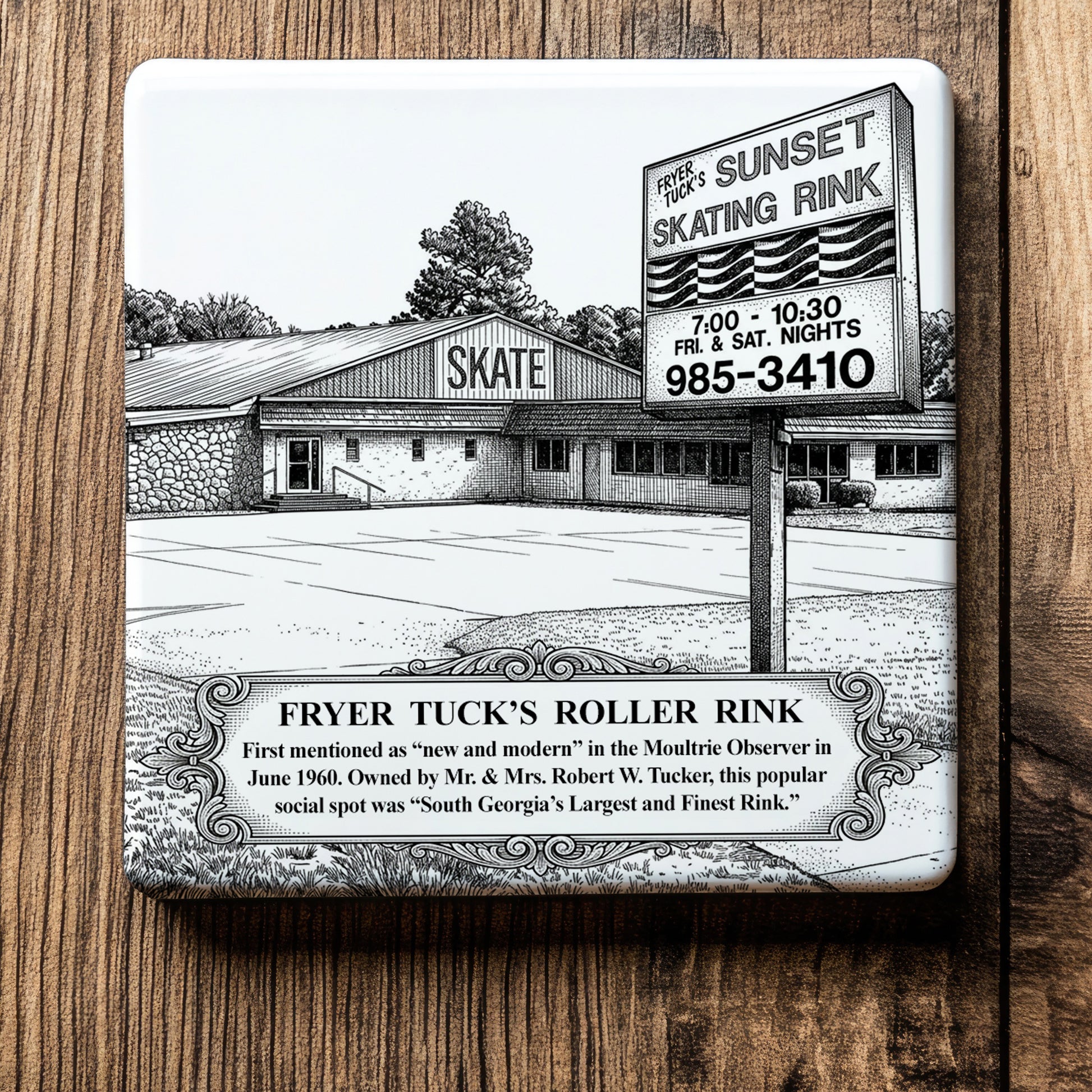 White ceramic coaster with a vintage pen-and-ink engraving of Fryer Tuck's Sunset Skating Rink in Moultrie, Georgia. Features the building's historic road sign, "SKATE" banner, and a detailed timeline text box, set on a wood background.